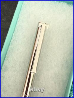 NEW! NEVER USED Tiffany T-Clip Retractable Silver Rhodium Pen, made in Germany