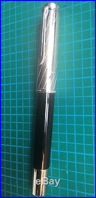 Pelikan 600 M625 sterling silver and semi-transparent Aubergine F fountain pen